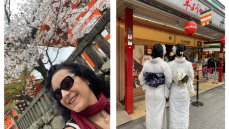 Image of a woman in front of a cherry blossom tree